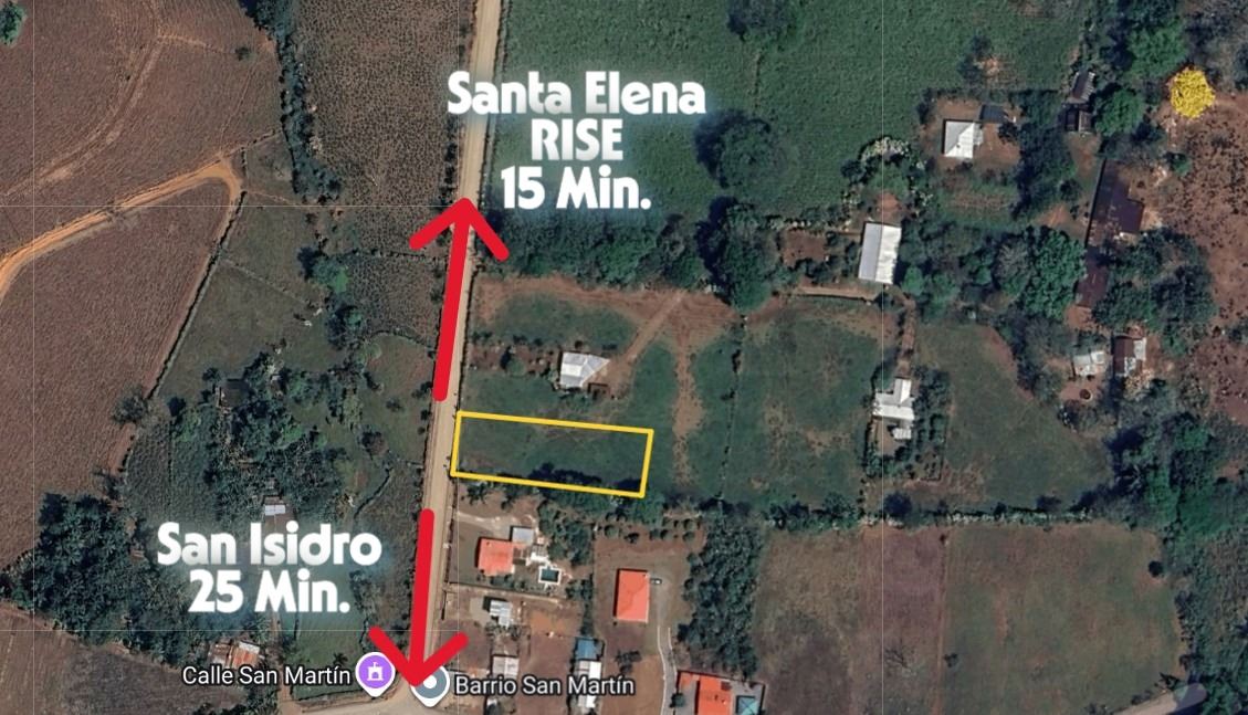 Aerial map with a north-south road, red arrows show travel times—Santa Elena 15 min and San Isidro 25 min; a yellow-outlined rectangular parcel sits to the east of the road.